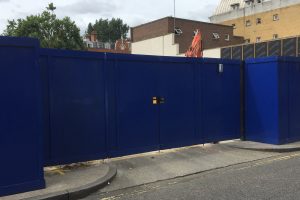 Large blue commercial fencing and gate